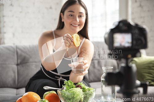 Image of Caucasian blogger woman make vlog how to diet and lost weight. Lifestyle, influencer women, healthy concept.