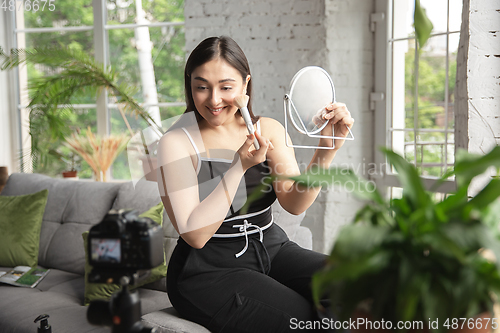 Image of Caucasian blogger woman make vlog how to be body positive and taking beauty treatment. Lifestyle, influencer women, healthy concept.