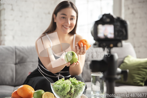Image of Caucasian blogger woman make vlog how to diet and lost weight. Lifestyle, influencer women, healthy concept.