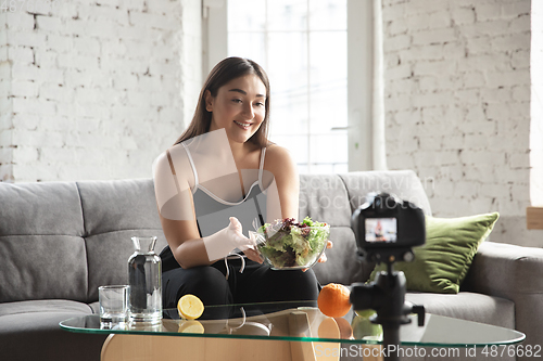 Image of Caucasian blogger woman make vlog how to diet and lost weight. Lifestyle, influencer women, healthy concept.