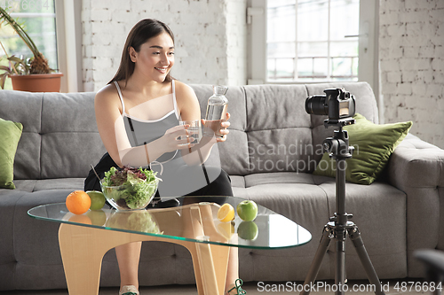 Image of Caucasian blogger woman make vlog how to diet and lost weight. Lifestyle, influencer women, healthy concept.