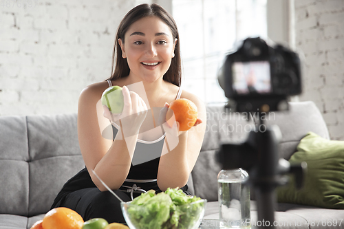 Image of Caucasian blogger woman make vlog how to diet and lost weight. Lifestyle, influencer women, healthy concept.