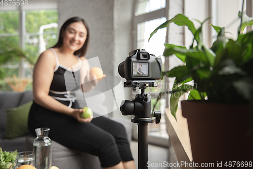 Image of Caucasian blogger woman make vlog how to diet and lost weight. Lifestyle, influencer women, healthy concept.