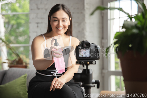 Image of Caucasian blogger woman make vlog how to be body positive and taking beauty treatment. Lifestyle, influencer women, healthy concept.