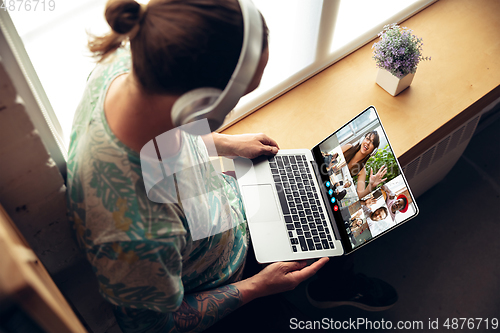 Image of Man participate video conference looking at laptop screen during virtual meeting, videocall webcam app for business, close up