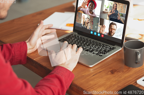 Image of Man participate video conference looking at laptop screen during virtual meeting, videocall webcam app for business, close up