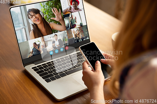 Image of Woman participate video conference looking at laptop screen during virtual meeting, videocall webcam app for business, close up