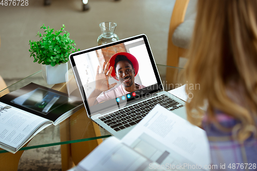 Image of Woman participate video conference looking at laptop screen during virtual meeting, videocall webcam app for business, close up