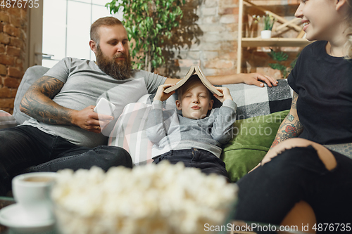 Image of Happy family at home spending time together. Having fun, look cheerful and lovely.