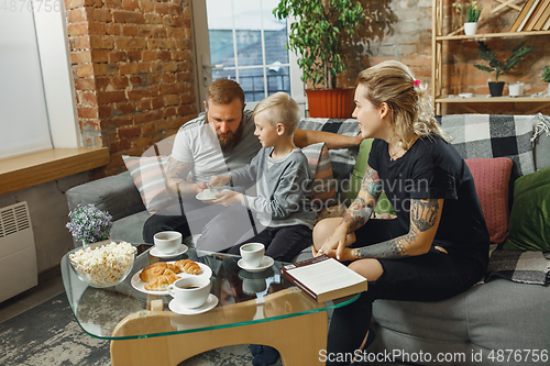 Image of Happy family at home spending time together. Having fun, look cheerful and lovely.