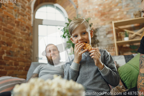 Image of Happy family at home spending time together. Having fun, look cheerful and lovely.