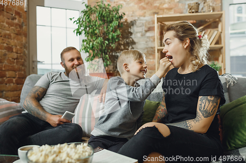 Image of Happy family at home spending time together. Having fun, look cheerful and lovely.