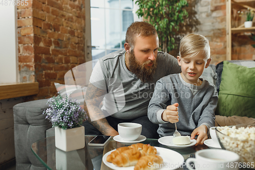 Image of Happy family at home spending time together. Having fun, look cheerful and lovely.