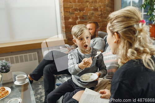 Image of Happy family at home spending time together. Having fun, look cheerful and lovely.