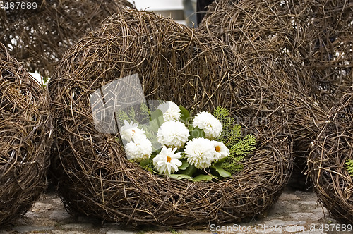 Image of Decorative of dahlia flowers over cushion
