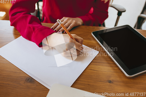 Image of Business young caucasian woman in modern office with team