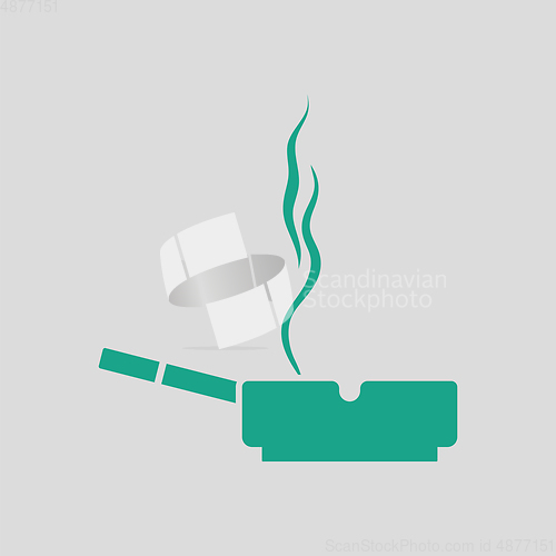 Image of Cigarette in an ashtray icon