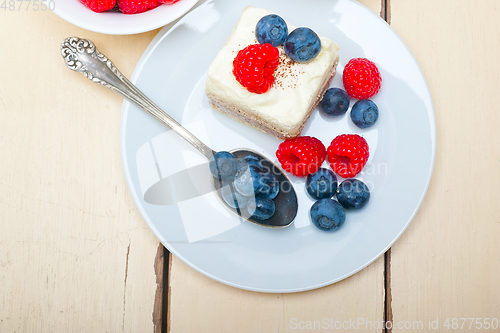 Image of fresh raspberry and blueberry cake