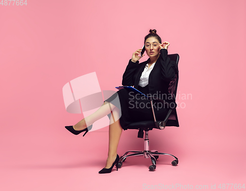 Image of Young caucasian woman in office attire. Bodypositive female character. plus size businesswoman