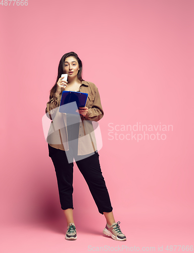 Image of Young caucasian woman in casual wear. Bodypositive female character. plus size businesswoman