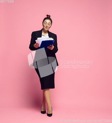 Image of Young caucasian woman in office attire. Bodypositive female character. plus size businesswoman