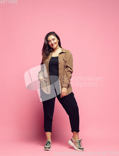 Image of Young caucasian woman in casual wear. Bodypositive female character. plus size businesswoman