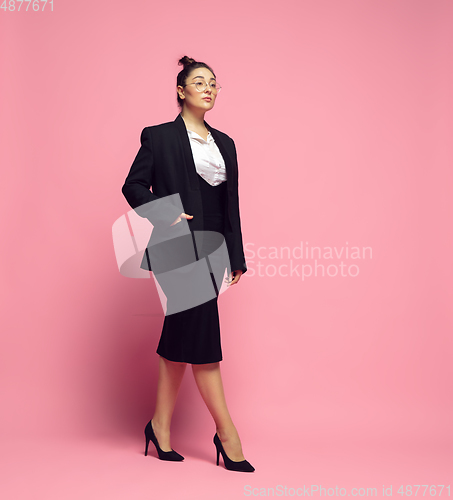 Image of Young caucasian woman in office attire. Bodypositive female character. plus size businesswoman