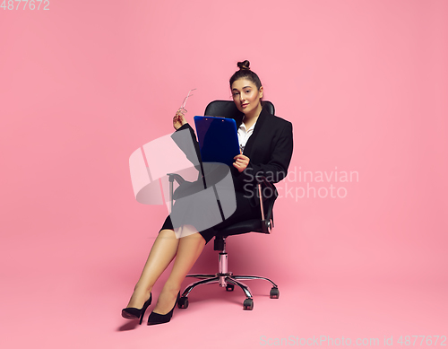 Image of Young caucasian woman in office attire. Bodypositive female character. plus size businesswoman