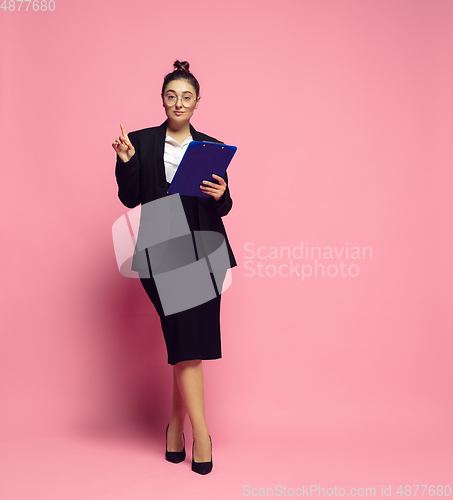 Image of Young caucasian woman in office attire. Bodypositive female character. plus size businesswoman