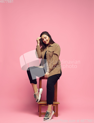Image of Young caucasian woman in casual wear. Bodypositive female character. plus size businesswoman