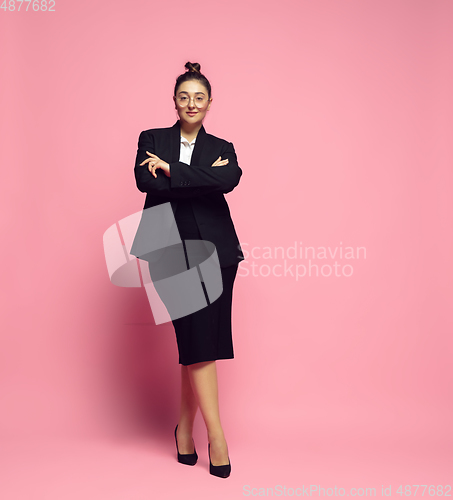 Image of Young caucasian woman in office attire. Bodypositive female character. plus size businesswoman