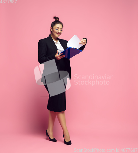 Image of Young caucasian woman in office attire. Bodypositive female character. plus size businesswoman