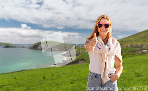 Image of woman showing thumbs up in ireland