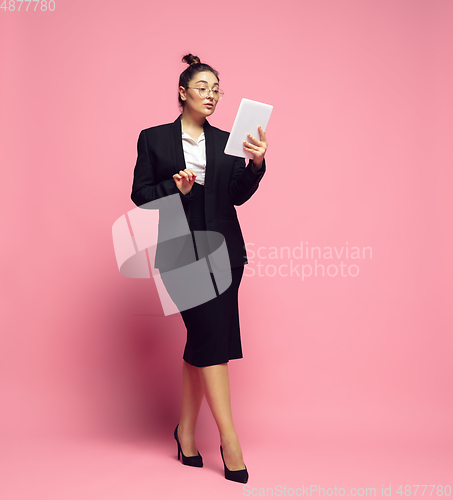 Image of Young caucasian woman in office attire. Bodypositive female character. plus size businesswoman