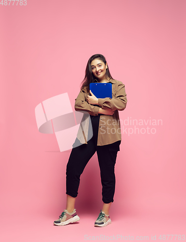 Image of Young caucasian woman in casual wear. Bodypositive female character. plus size businesswoman