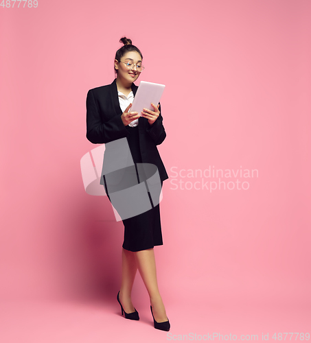Image of Young caucasian woman in office attire. Bodypositive female character. plus size businesswoman