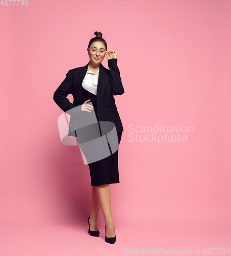 Image of Young caucasian woman in office attire. Bodypositive female character. plus size businesswoman