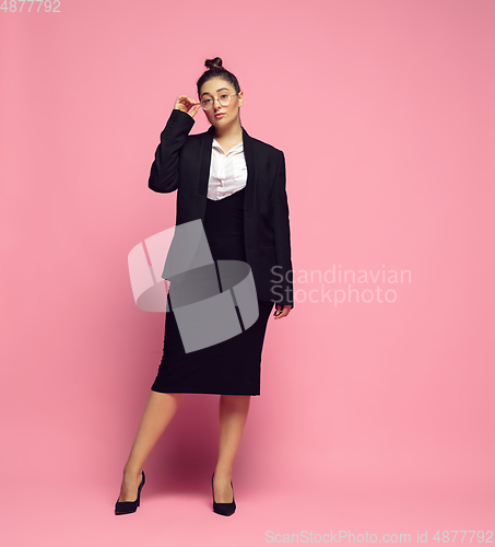 Image of Young caucasian woman in office attire. Bodypositive female character. plus size businesswoman