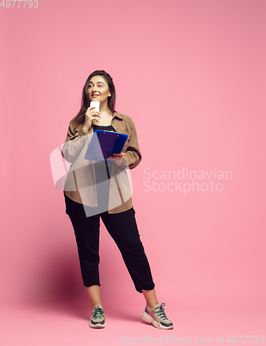 Image of Young caucasian woman in casual wear. Bodypositive female character. plus size businesswoman