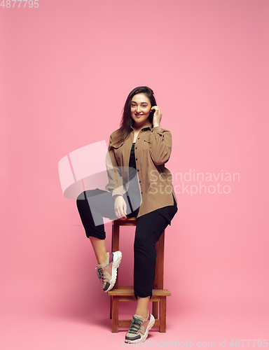 Image of Young caucasian woman in casual wear. Bodypositive female character. plus size businesswoman