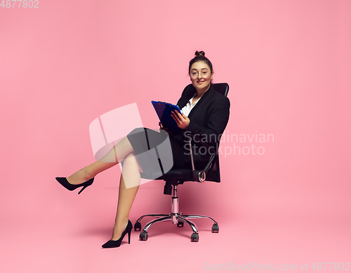 Image of Young caucasian woman in office attire. Bodypositive female character. plus size businesswoman