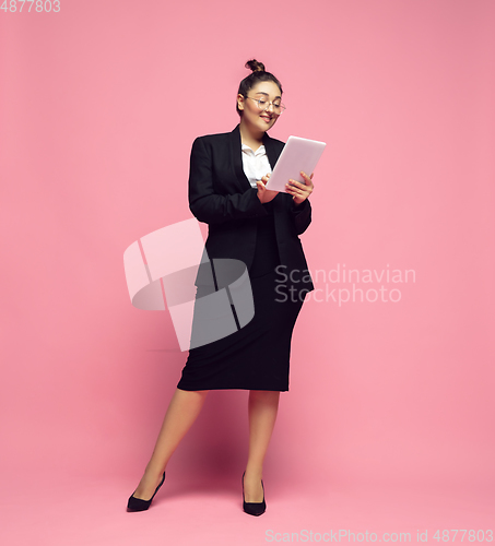 Image of Young caucasian woman in office attire. Bodypositive female character. plus size businesswoman