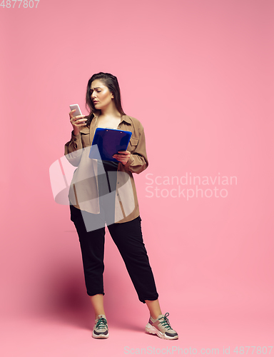 Image of Young caucasian woman in casual wear. Bodypositive female character. plus size businesswoman