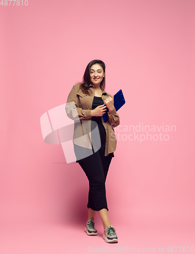 Image of Young caucasian woman in casual wear. Bodypositive female character. plus size businesswoman