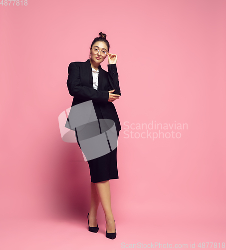 Image of Young caucasian woman in office attire. Bodypositive female character. plus size businesswoman