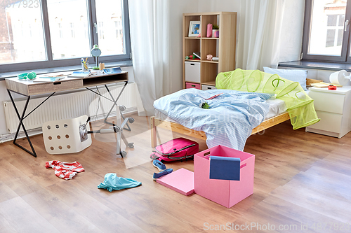 Image of messy home or kid's room with scattered stuff