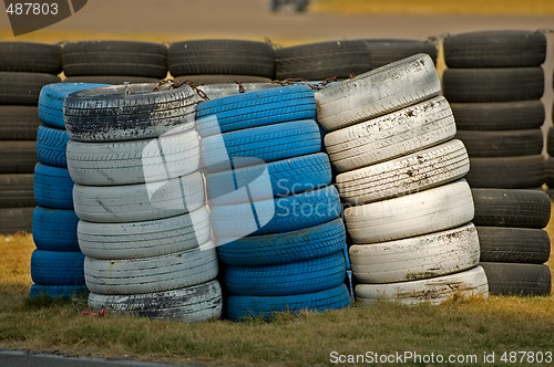 Image of Roadside stacked tyres