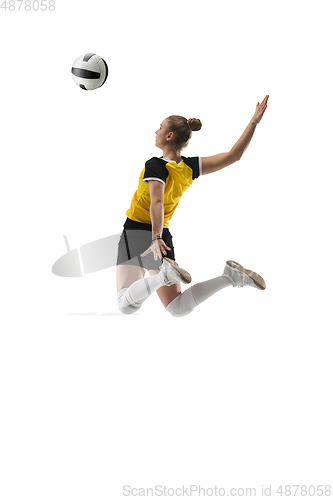 Image of Young female volleyball player isolated on white studio background. Woman in sport\'s equipment training and practicing.