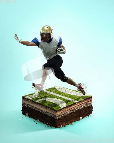 Image of American football player on blue background above stadium layers. Professional sportsman during game playing in action and motion.