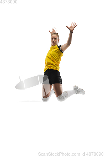 Image of Young female volleyball player isolated on white studio background. Woman in sport\'s equipment training and practicing.